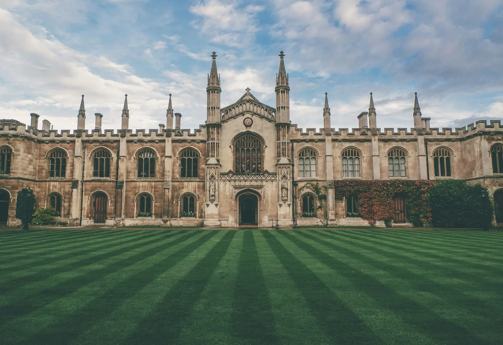 Historic Cambridge college buildings surrounding a formal lawn