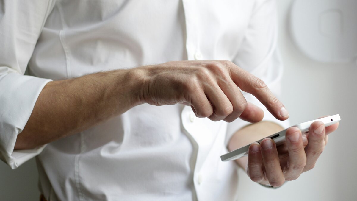Professional using mobile app