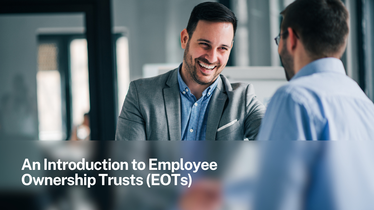 Business owner engaging with employees after transitioning to an Employee Ownership Trust.